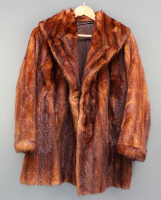 A lady's brown mink coat