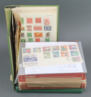 A Standard album Europe, Asia, Africa, United States, an Adelphi green album of GB stamps, Empire stamps 1924-67, an album of used GB and World stamps, an Elizabeth II 1957 Pitcairn first day cover the reverse signed by Tom Christian and a collection of loose stamps and first day covers