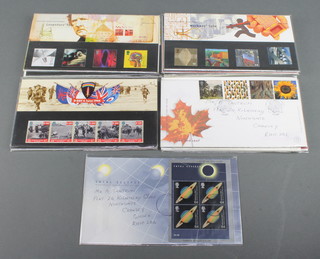 A quantity of various Elizabeth II GB presentation stamps and a small quantity of first day covers and Kensitas silk cigarette cards