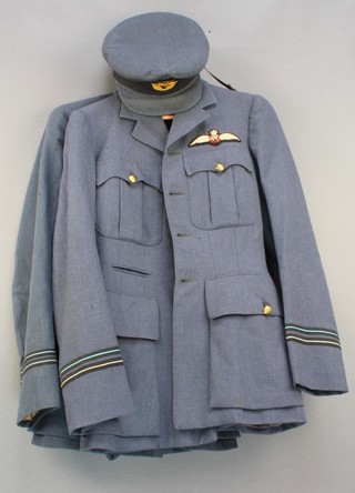 A George VI Royal Air Force flying officer's tunic by Moss Bros with pilots wings (some moth), 1 other tunic and an RAF officers cap 