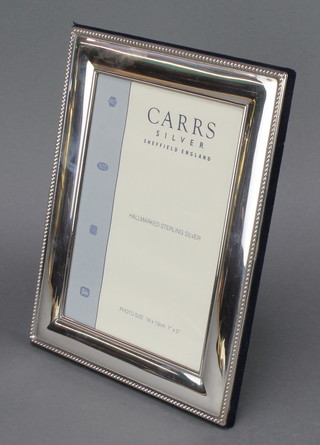 A Sterling silver rectangular photograph frame 9" x 7", boxed