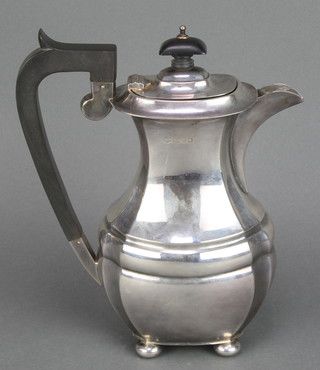 A silver coffee pot with ebonised mounts, Chester 1931, gross weight 434 grams 