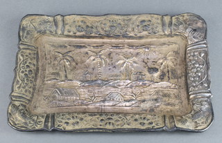 An Indian repousse silver tray with village scene 212 grams 10 1/2" 