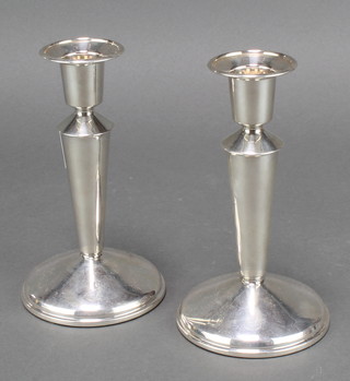A pair of silver tapered candlesticks Birmingham 1972 6"