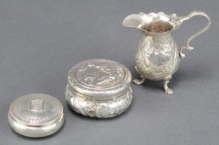 A Georgian design repousse silver cream jug Birmingham 1918 and 2 Continental pill boxes 132 grams 