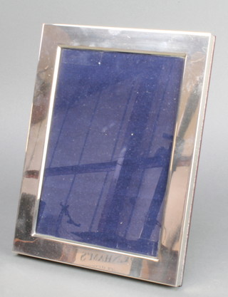 A sterling silver rectangular photograph frame 8 1/2" x 6 1/2" 