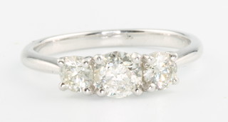 An 18ct white gold 3 stone diamond ring, approx. 1.02ct, size M 1/2
