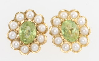 A pair of 18ct yellow gold peridot and seed pearl ear studs 
