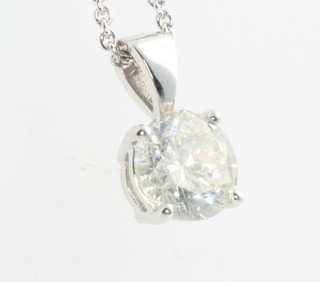 A platinum single stone diamond pendant, 1.58ct on a ditto chain