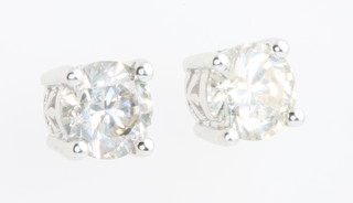 A pair of 18ct white gold brilliant cut diamond ear studs, approx. 2ct