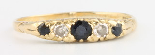 An 18ct sapphire and diamond ring, size Q 1/2