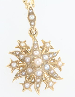 A 15ct yellow gold seed pearl pendant on a 9ct gold chain 16mm 