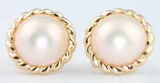 A pair of 14ct yellow gold pearl ear studs