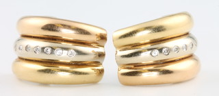 A pair of 18ct yellow gold and diamond ear studs 