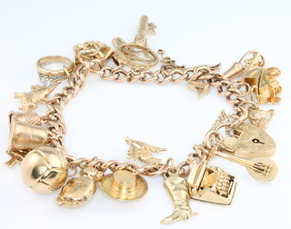 A 9ct yellow gold charm bracelet, 40 grams 