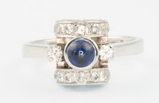 A white gold Art Deco style cabochon cut sapphire and diamond ring size L 