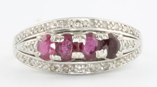 A 14ct white gold ruby and diamond ring size O 