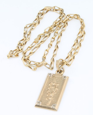 A 9ct yellow gold pendant and chain 8.2 grams