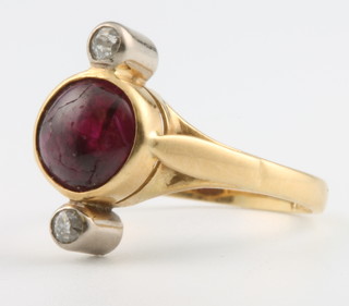 An 18ct ruby and diamond cabochon cut ring, size L 