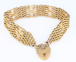 A 9ct yellow gold chased bracelet and padlock 11.3 grams