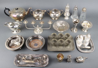 A stylish silver plated candelabrum and minor plated items