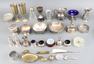 A silver plated trophy cup and minor plated items