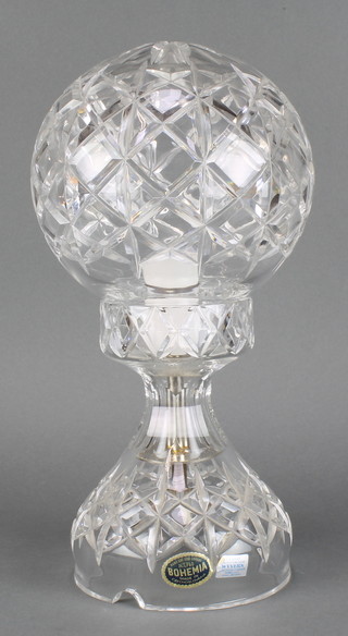 A Bohemian cut glass table lamp with spherical shade and waisted base 12" 