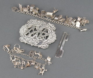 A Royal Masonic Hospital nurses silver buckle Birmingham 1970 and 2 silver charm bracelets 217 grams 