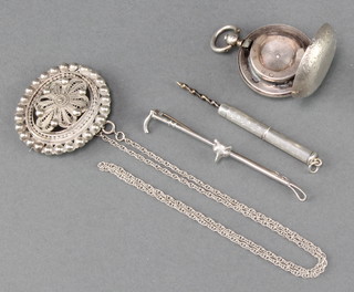 A Victorian silver sovereign case and minor items