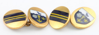 A pair of gold plated enamelled cufflinks
