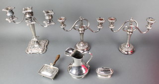 A pair of silver plated candelabra and other plated items 