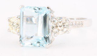 An 18ct white gold baguette cut aquamarine and 2 stone diamond ring, the centre stone approx. 3cts, the diamonds approx. 0.75ct size O 