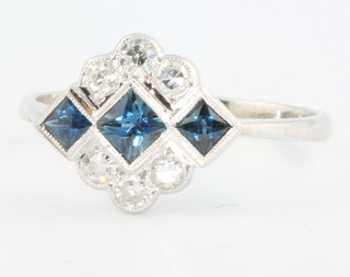 An 18ct white gold Art Deco style sapphire and diamond ring size P