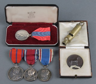 A group of 3 medals to P C H Tantrum Metropolitan Police, a George V Coronation medal, a George V Jubilee medal, a George VI Coronation medal mounted for wear together with a bronze medallion marked No.3 District Metropolitan Police best trained horse 2nd with a police whistle and an Elizabeth II issue Imperial Service medal to Alfred Arthur Bragg cased