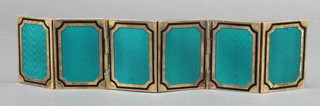 An Italian 925 silver gilt and enamel 6 section folding photograph frame, each section 1 1/2" x 1" 
