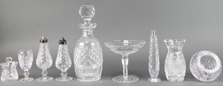 A Waterford Crystal decanter and stopper 11", a pair of condiments 6", 2 vases, a mustard pot and lid, a sherry, a tazza and free form vase 
