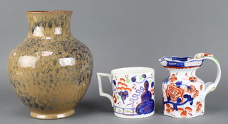 A 19th Century lustre mug, an Ironstone jug (damage to handle) and a Lancastrian pottery baluster vase with mottled decoration 9" 
