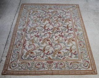 A small Aubusson style rug with white ground 113" x 91" 