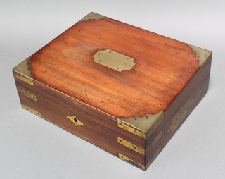 A Victorian mahogany and brass banded writing slope with hinged lid, having a plaque to the centre marked Edward Jones 4"h x 12"w x 10"d 