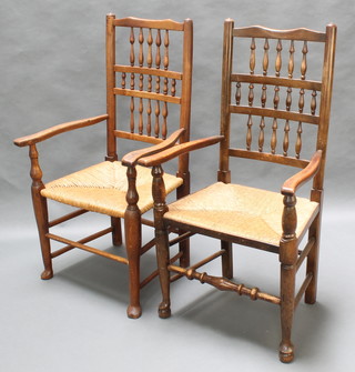A pair of elm Lancashire ladder back carver chairs with woven rush seats  