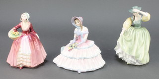 Three Royal Doulton figures - Janet HN1537 6 1/2", Day Dreams HN1731 6", Buttercup HN2309 7" 
