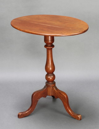 A Victorian oval mahogany snap top wine table raised on pillar and tripod base 26"h x 22"w x 16"d 