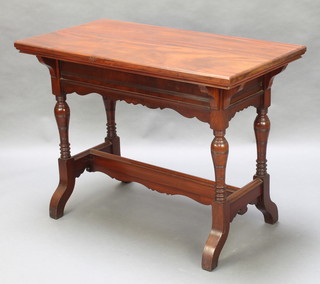 A Victorian mahogany stretcher/library table raised on turned supports with H framed stretcher 31"h x 42"w x 22"d 