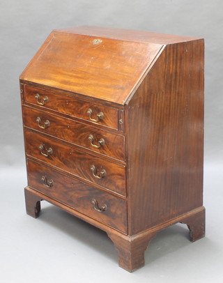 A George III mahogany bureau, the fall front revealing a well fitted interior above 4 long drawers with brass swan neck drop handles, raised on bracket feet 41"h x 35"w x 20"d 