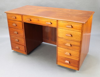A 1930's mahogany pedestal desk fitted 1 long and 10 short drawers 31 1/2"h x 54"w x 25"d 
