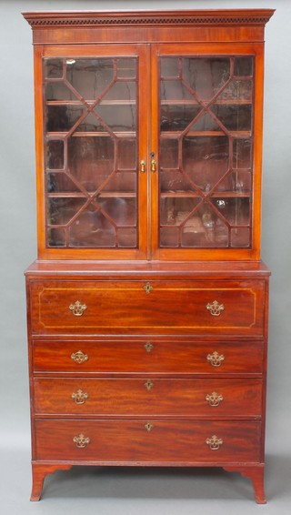 A 19th Century mahogany secretaire bookcase, the upper section with moulded and dentil cornice, the interior fitted adjustable shelves enclosed by astragal glazed panelled doors, the base with a well fitted secretaire drawer above 3 long graduated drawers raised on bracket feet 85 1/2"h x 41 1/2"w x 21"d 