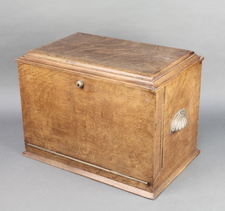 Ortner & Hole of 3 St James's Street, a Victorian oak stationery box with fitted interior complete with 2 inkwells and a writing slope 12"h x 17"w x 11 1/2"d 