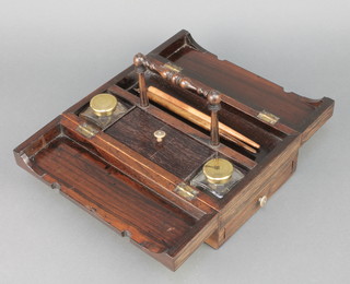 A Victorian rectangular rosewood writing box fitted 2 glass inkwells, the base fitted a drawer  5 1/2"h x 9 1/2"w x 6"d 