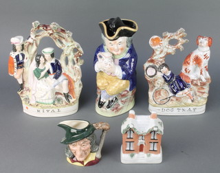 A Victorian Staffordshire figure group Rival 8" do. Dog Tray 8" a 19th Century Toby jug and lid, do. money bank in the form of a house 4" and a Royal Doulton character jug Pied Piper D6462 4" 