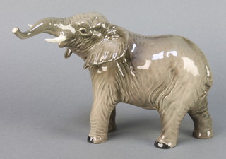 A Beswick figure of an elephant 8" 